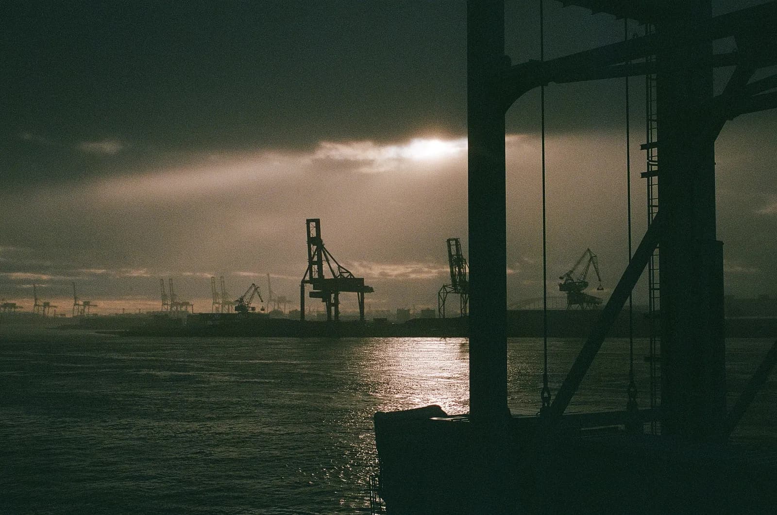 Abstract photograph representing the challenge of attribution in AI search visibility, with layered light and shadow suggesting measurement complexity.