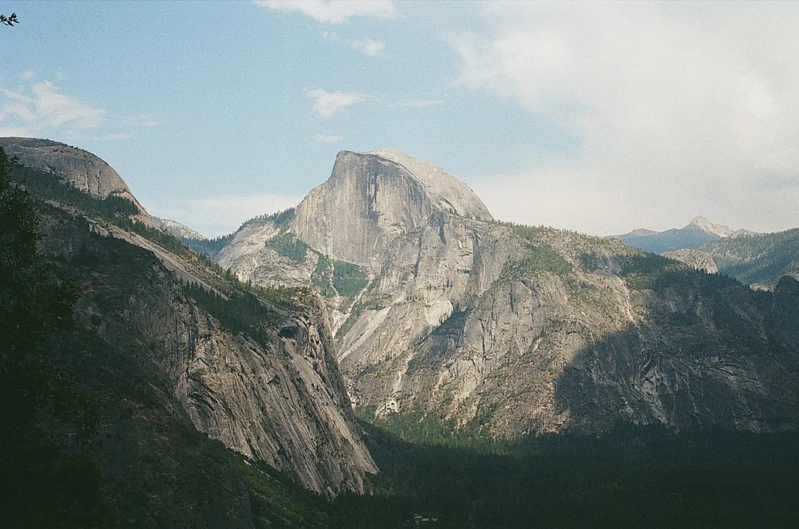 Yosemite valley with Half Dome rising in the background, every path through the landscape connected by a single vantage point, the same way Sill connects content across every CMS to a single AI visibility pipeline